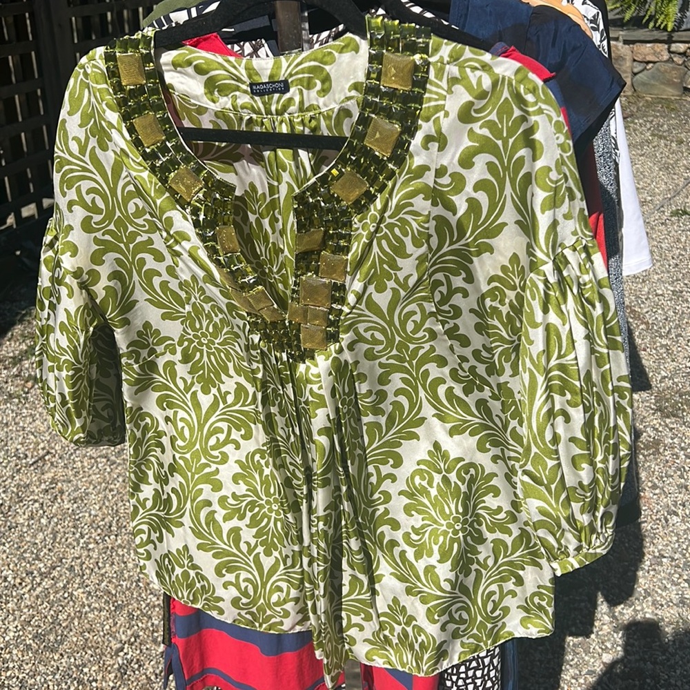 Magaschoni Cover up with green jewels around the neck.